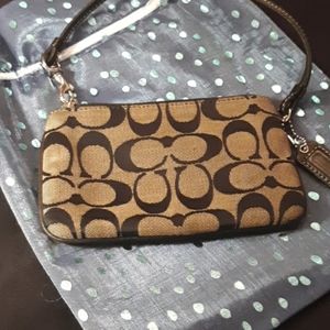 A small wristlet. used
